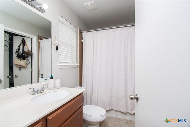 2324 Bellmont, Temple, TX 76504 - full bath with vanity, toilet, and a shower with curtain