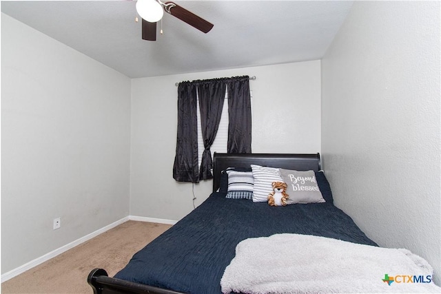 2324 Bellmont, Temple, TX 76504 - bedroom with carpet flooring, baseboards, and a ceiling fan