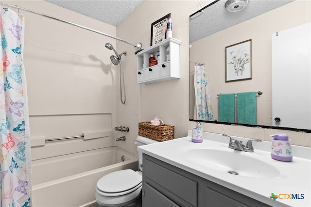 full bathroom with vanity, shower / bath combination with curtain, a textured ceiling, and toilet