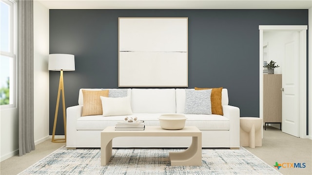 living room with carpet floors and baseboards