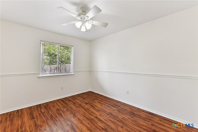 8430 Alvin High Ln, Austin, TX 78729 - unfurnished room featuring wood finished floors, baseboards, and a ceiling fan