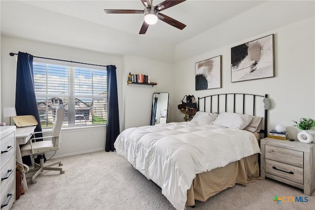 4032 Wild Bloom Rd, Seguin, TX 78155 - bedroom featuring light carpet, lofted ceiling, ceiling fan, and a desk