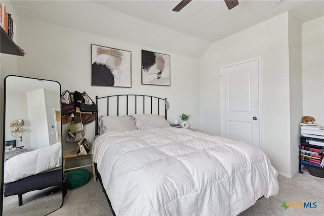 4032 Wild Bloom Rd, Seguin, TX 78155 - carpeted bedroom with vaulted ceiling and a ceiling fan