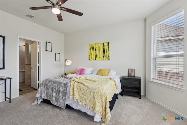 4032 Wild Bloom Rd, Seguin, TX 78155 - carpeted bedroom featuring baseboards and a ceiling fan