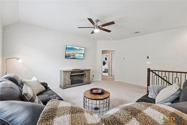 4032 Wild Bloom Rd, Seguin, TX 78155 - living room with ceiling fan, carpet flooring, and vaulted ceiling