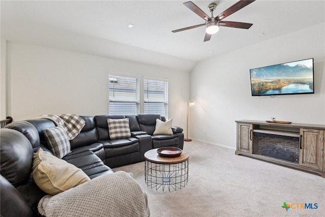 4032 Wild Bloom Rd, Seguin, TX 78155 - living area with light carpet, ceiling fan, and vaulted ceiling