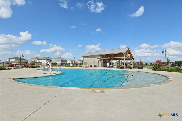 4032 Wild Bloom Rd, Seguin, TX 78155 - community pool with a patio