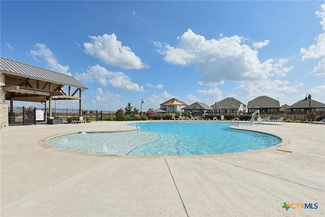 4032 Wild Bloom Rd, Seguin, TX 78155 - community pool featuring a patio