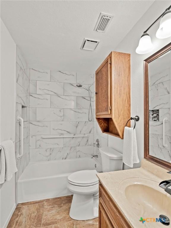 full bath featuring vanity, bathing tub / shower combination, toilet, and visible vents