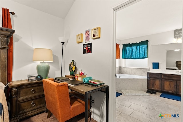 office space with light tile patterned floors