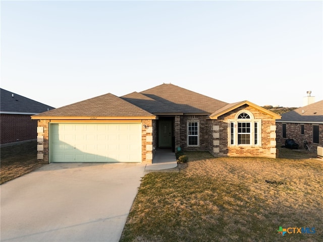 ranch-style home with a garage, roof with shingles, concrete driveway, and brick siding