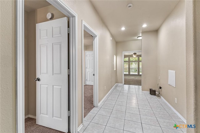 2003 Schottische Ln, Killeen, TX 76542 - hallway with light tile patterned floors, recessed lighting, baseboards, and light colored carpet