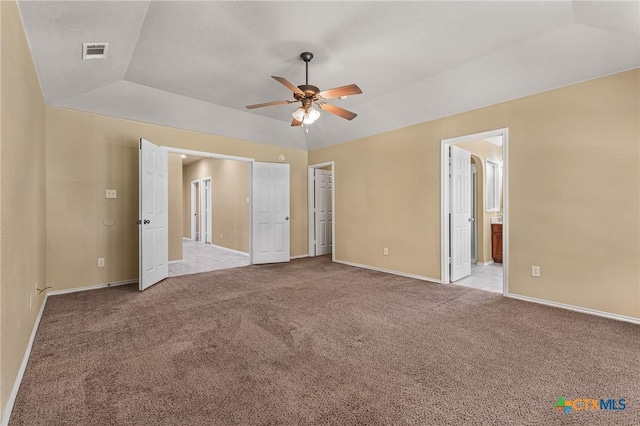 2003 Schottische Ln, Killeen, TX 76542 - unfurnished bedroom with carpet floors, baseboards, connected bathroom, a ceiling fan, and vaulted ceiling