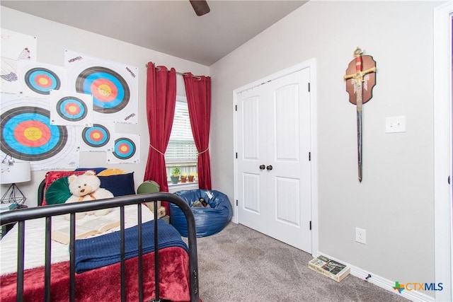 bedroom featuring ceiling fan and carpet flooring