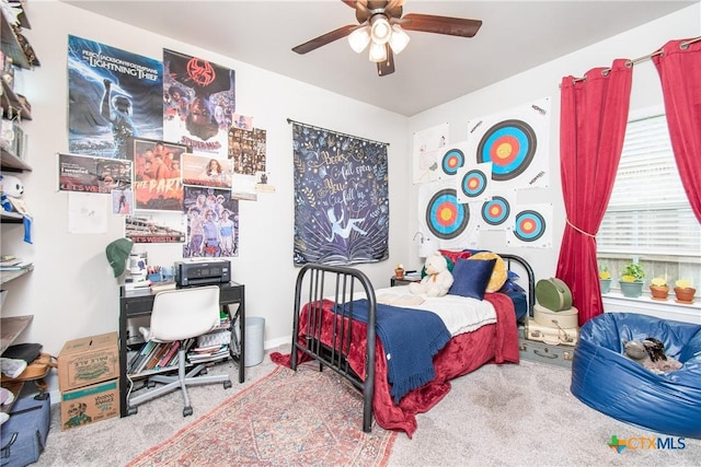 bedroom with ceiling fan and carpet