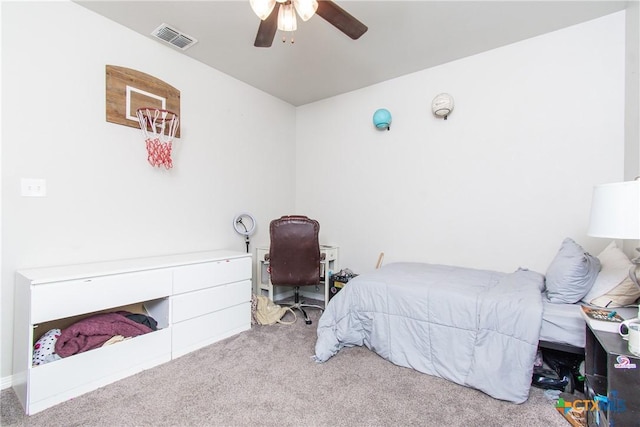 bedroom with ceiling fan and light carpet