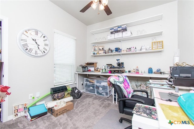 carpeted office with ceiling fan