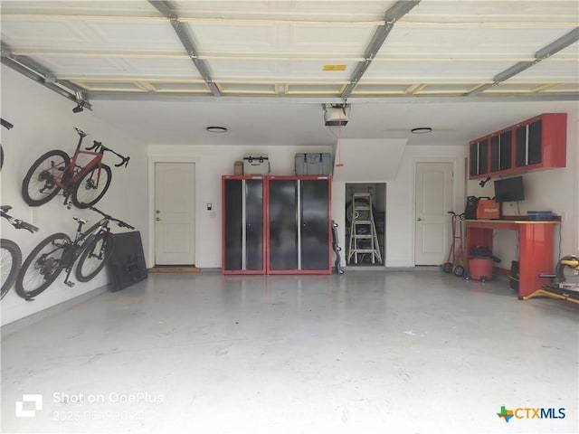 127 Augusta Dr, Wimberley, TX 78676 - garage with a garage door opener