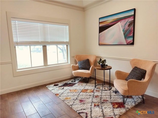 127 Augusta Dr, Wimberley, TX 78676 - sitting room featuring baseboards, wood finished floors, and ornamental molding