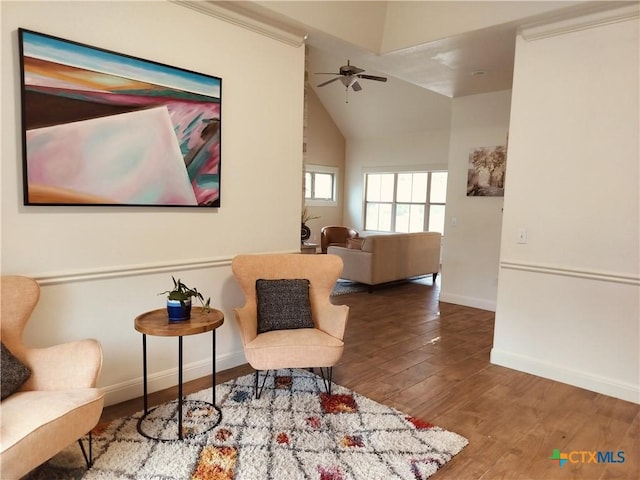 127 Augusta Dr, Wimberley, TX 78676 - sitting room featuring baseboards, a ceiling fan, wood finished floors, and vaulted ceiling