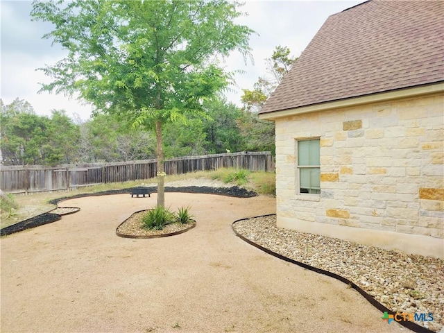 127 Augusta Dr, Wimberley, TX 78676 - fenced backyard with a patio area