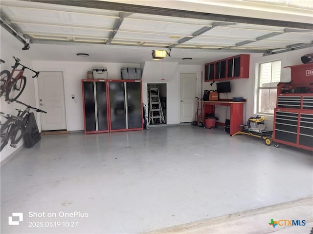 127 Augusta Dr, Wimberley, TX 78676 - garage with a garage door opener
