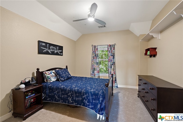 bedroom with ceiling fan, carpet flooring, visible vents, baseboards, and vaulted ceiling