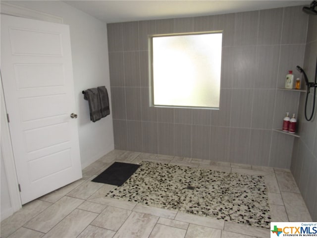 bathroom with a shower