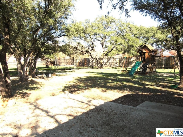 view of yard featuring a playground