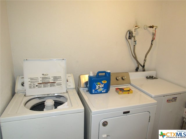 laundry area featuring washer and dryer