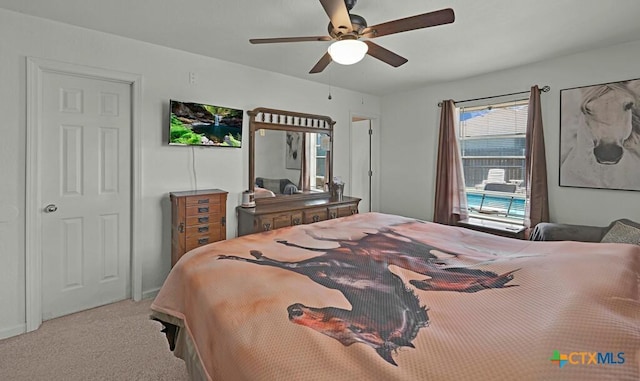 bedroom with carpet flooring and a ceiling fan