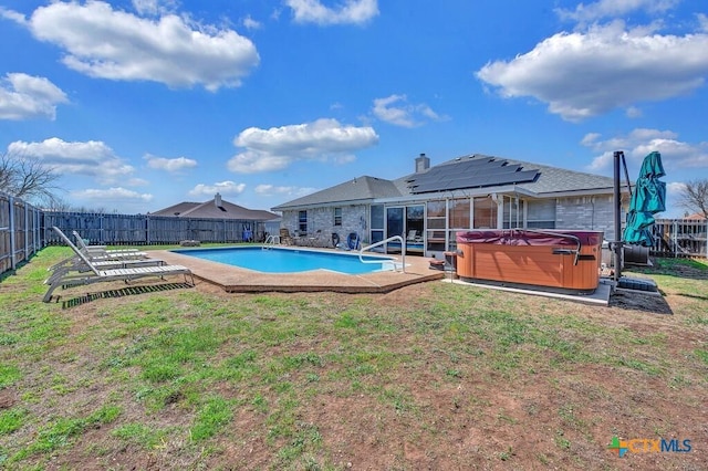 view of swimming pool with a fenced in pool, a yard, a fenced backyard, a hot tub, and a patio area