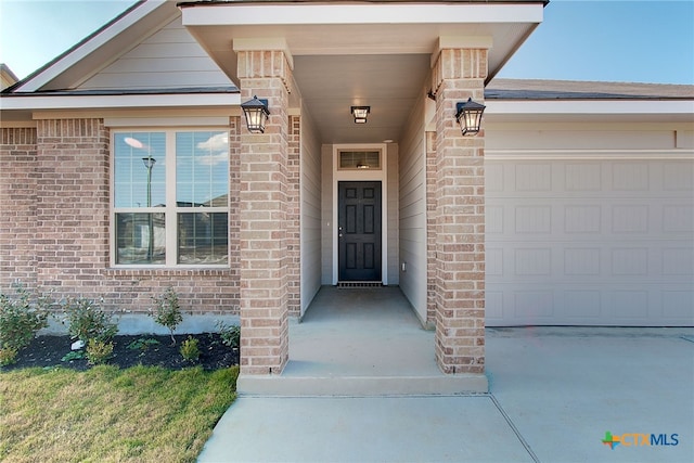 entrance to property with a garage