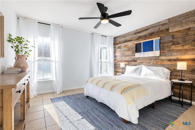 5445 Chimney Rock, Canyon Lake, TX 78133 - tiled bedroom featuring ceiling fan and wood walls