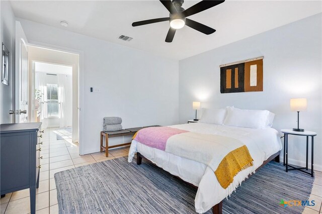 5445 Chimney Rock, Canyon Lake, TX 78133 - bedroom featuring ceiling fan and light tile patterned floors