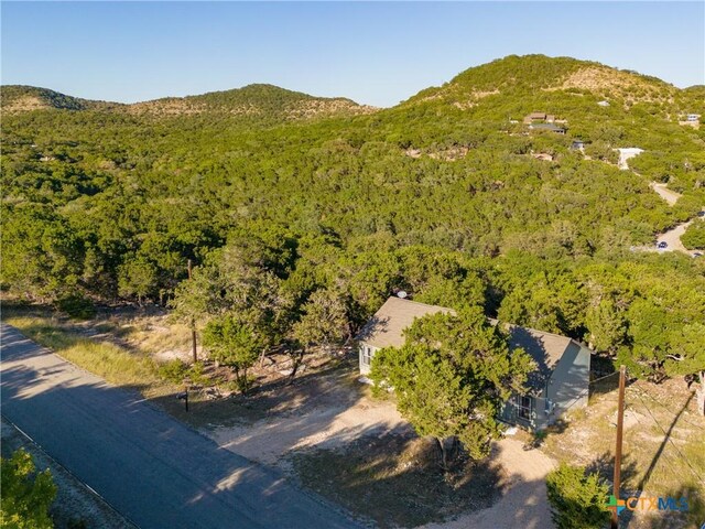 5445 Chimney Rock, Canyon Lake, TX 78133 - bird's eye view with a mountain view