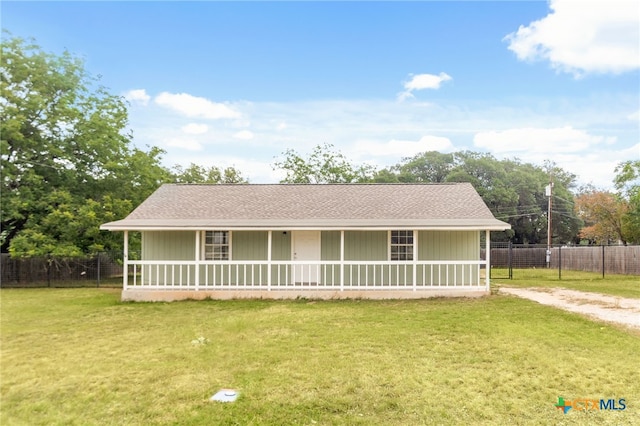 1582 Green Hill Dr, Canyon Lake, TX 78133 - view of front of home with driveway, covered porch, and roof with shingles