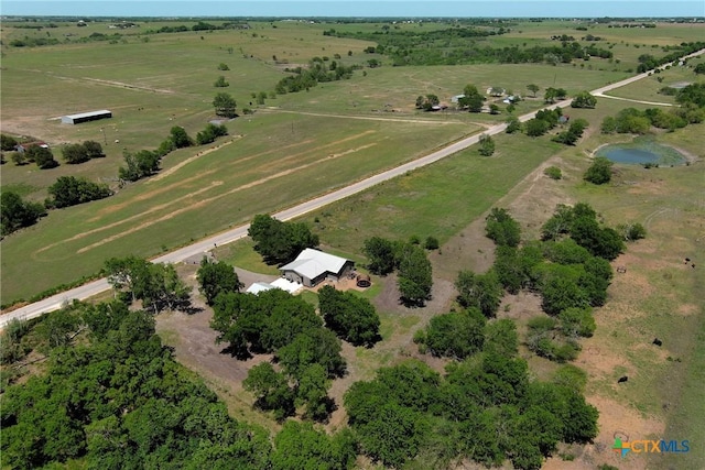 1319 County Road 339, Shiner, TX 77984 - aerial view of property and surrounding area with rural landscape