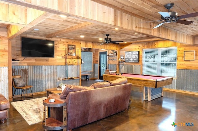 interior space with wood ceiling, ceiling fan, pool table, and wood walls