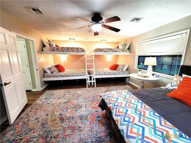 bedroom featuring hardwood / wood-style flooring and ceiling fan