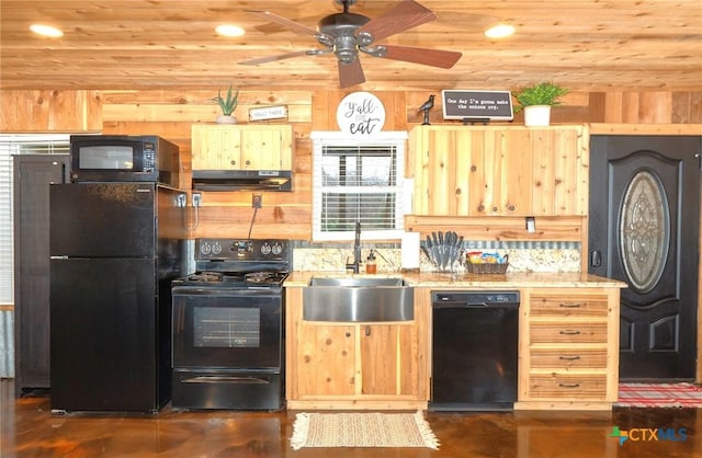 kitchen featuring sink, wood ceiling, black appliances, and wood walls