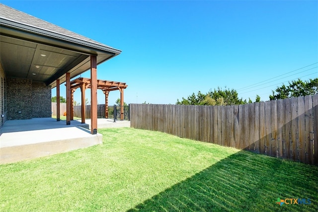 view of yard featuring a pergola and a patio area