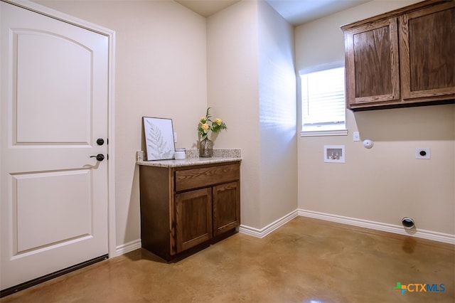 laundry room featuring hookup for an electric dryer, hookup for a washing machine, cabinets, and gas dryer hookup