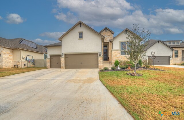 588 Vale Ct, New Braunfels, TX 78132 - view of front of house with a garage and a front lawn