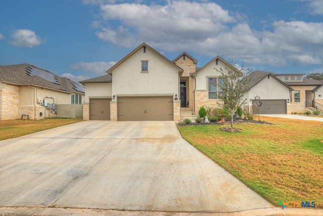 588 Vale Ct, New Braunfels, TX 78132 - view of front of property with a garage and a front yard