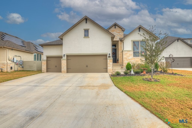 588 Vale Ct, New Braunfels, TX 78132 - view of front of property featuring a garage and a front yard