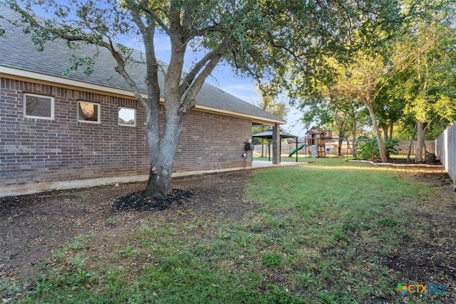 view of yard with a playground