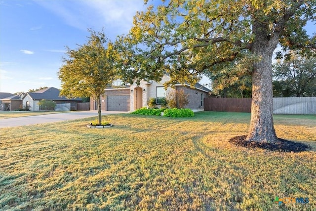 212 Lasata Ln, Belton, TX 76513 - view of front of house with concrete driveway and a garage