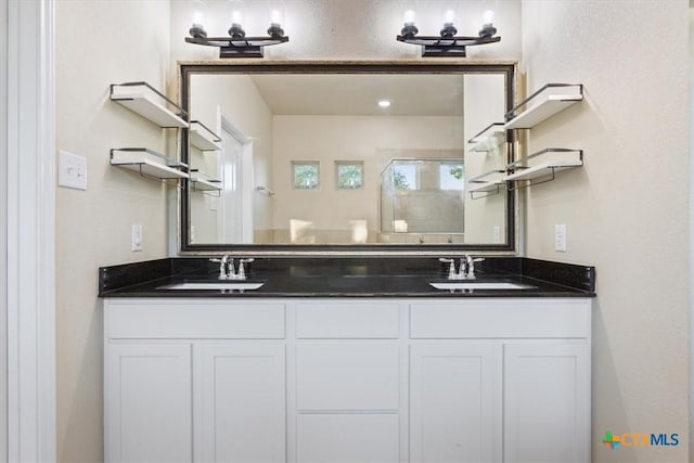 212 Lasata Ln, Belton, TX 76513 - full bathroom featuring a shower stall and double vanity