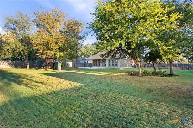 view of yard featuring a playground